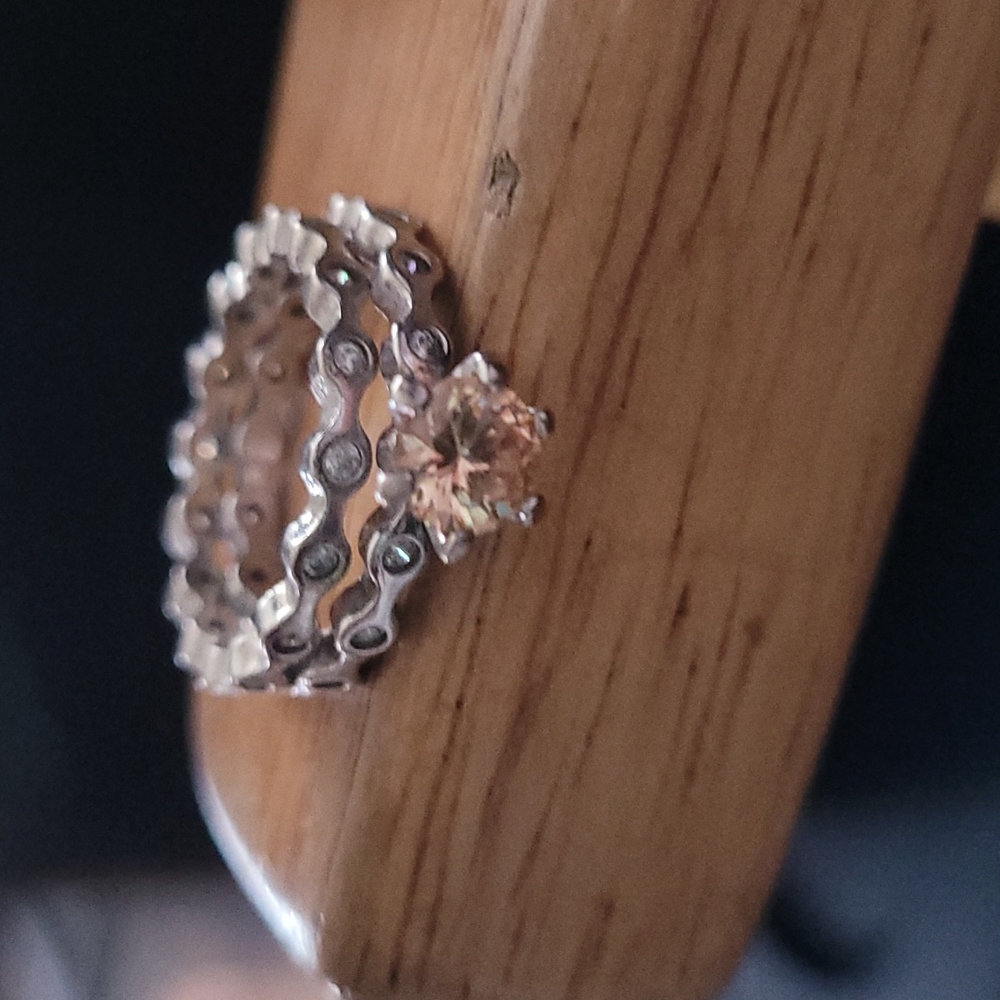 Costume jewelry ring. Peach stone w/ cubic zirconia.